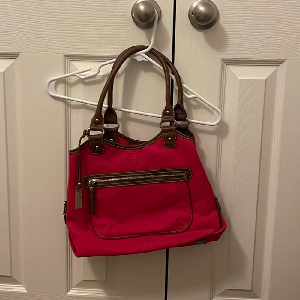 Pink purse with brown handles